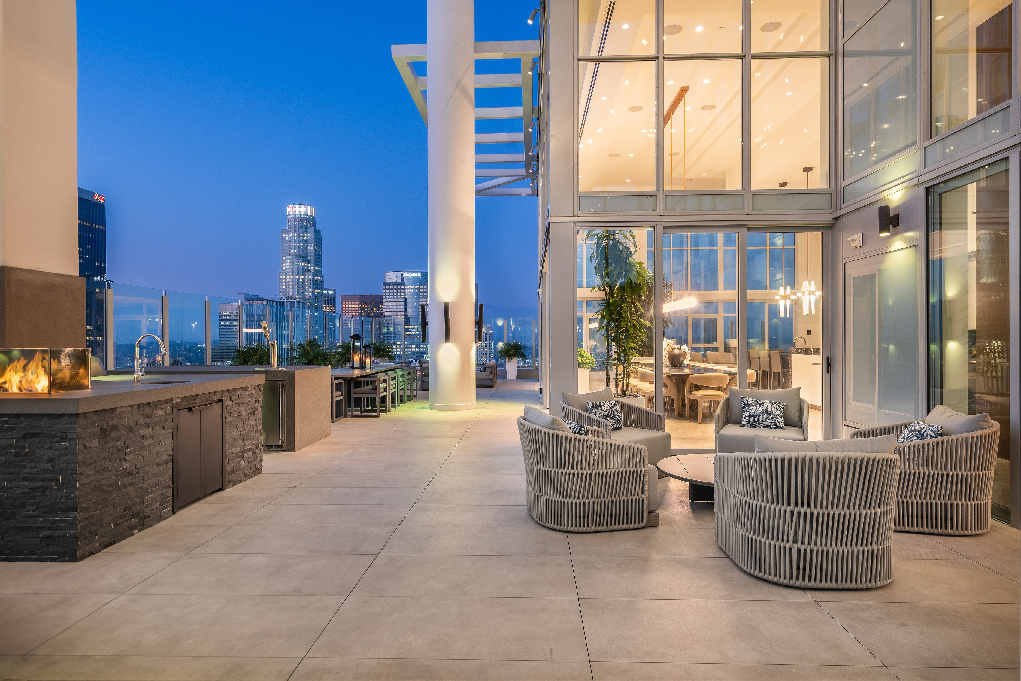 825 S. Hill interior at twilight over the Downtown LA skyline