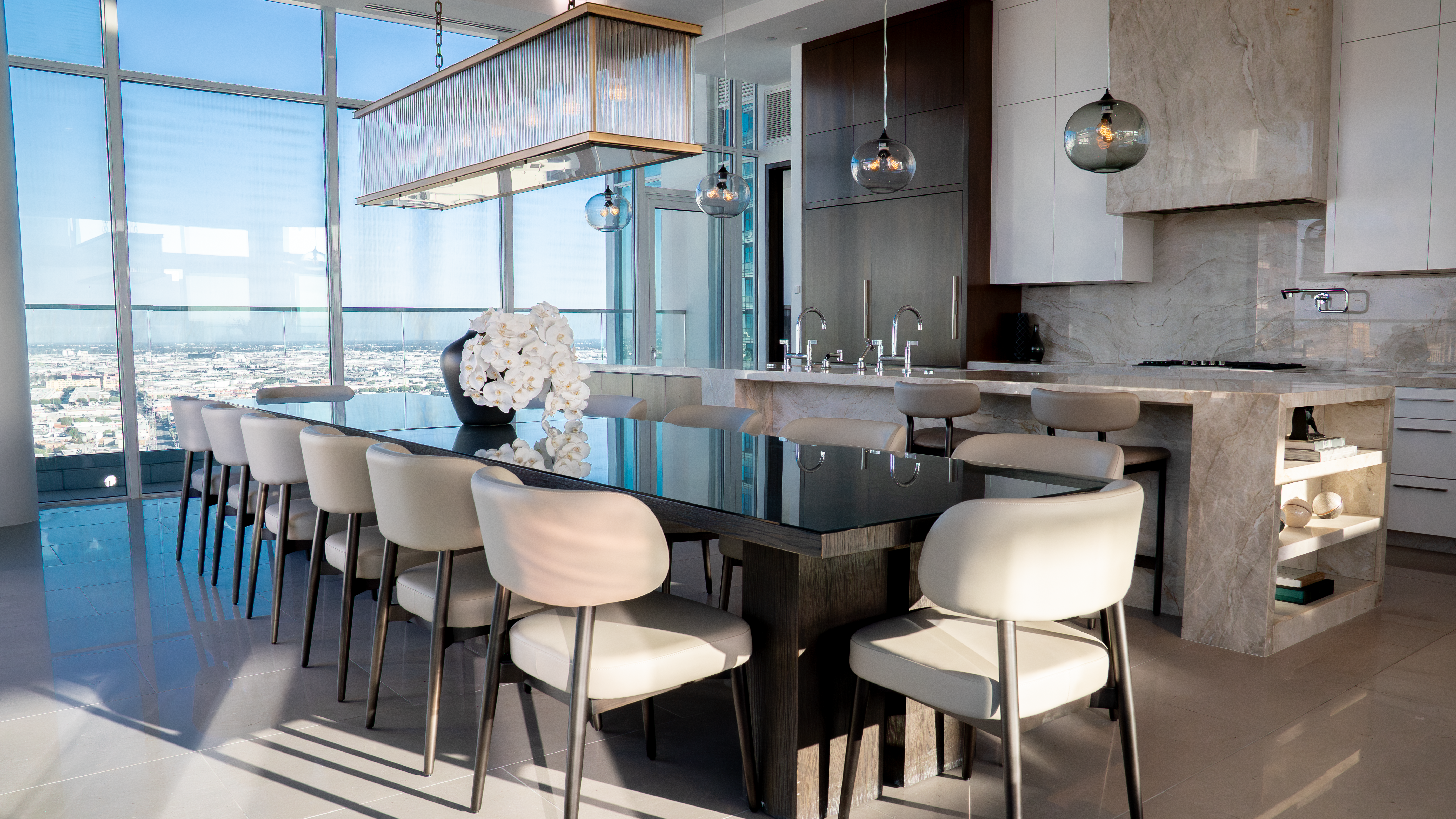 888 S. Olive chef's dining table and kitchen bar with city view