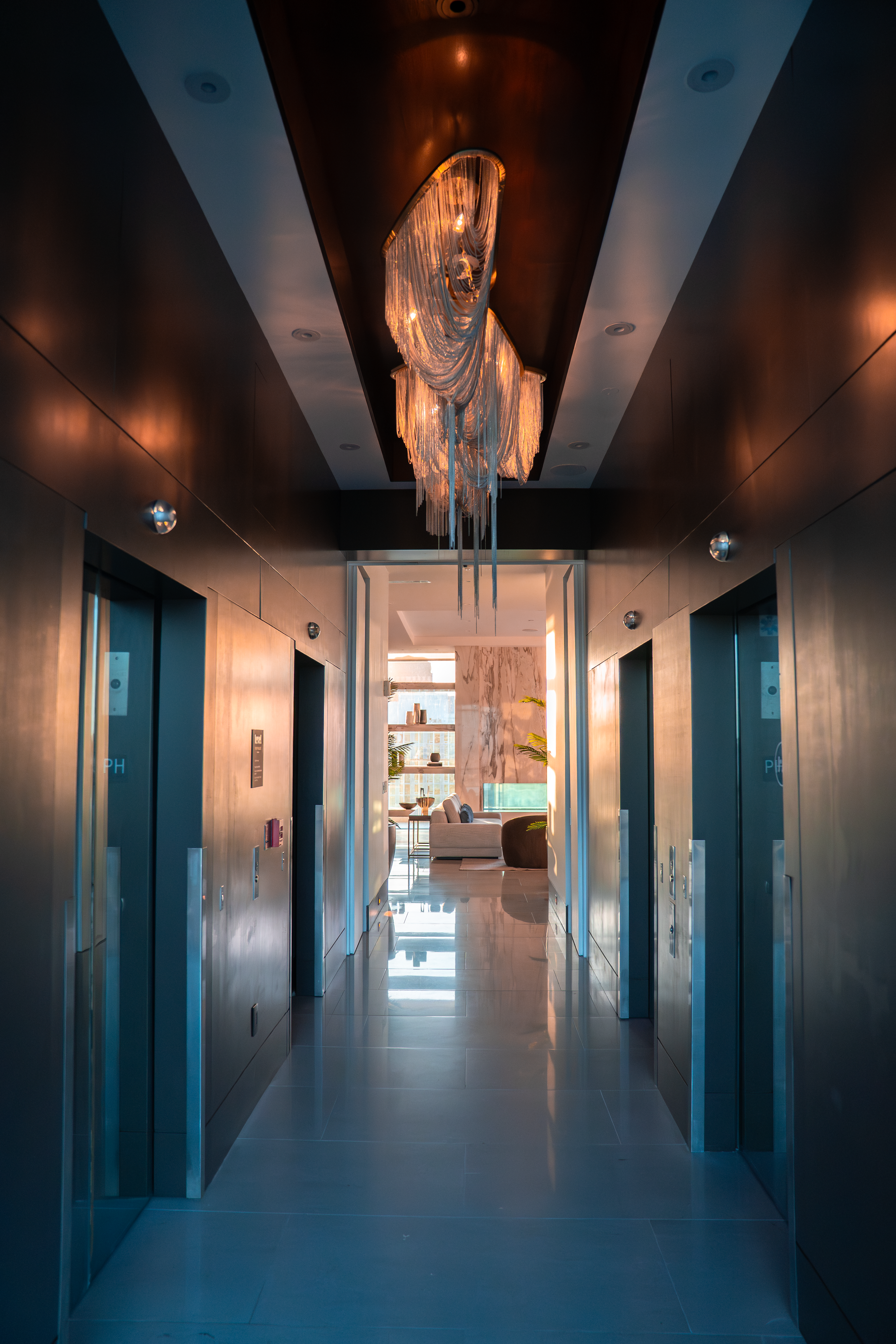 888 S. Olive private elevator lobby with dramatic chandelier