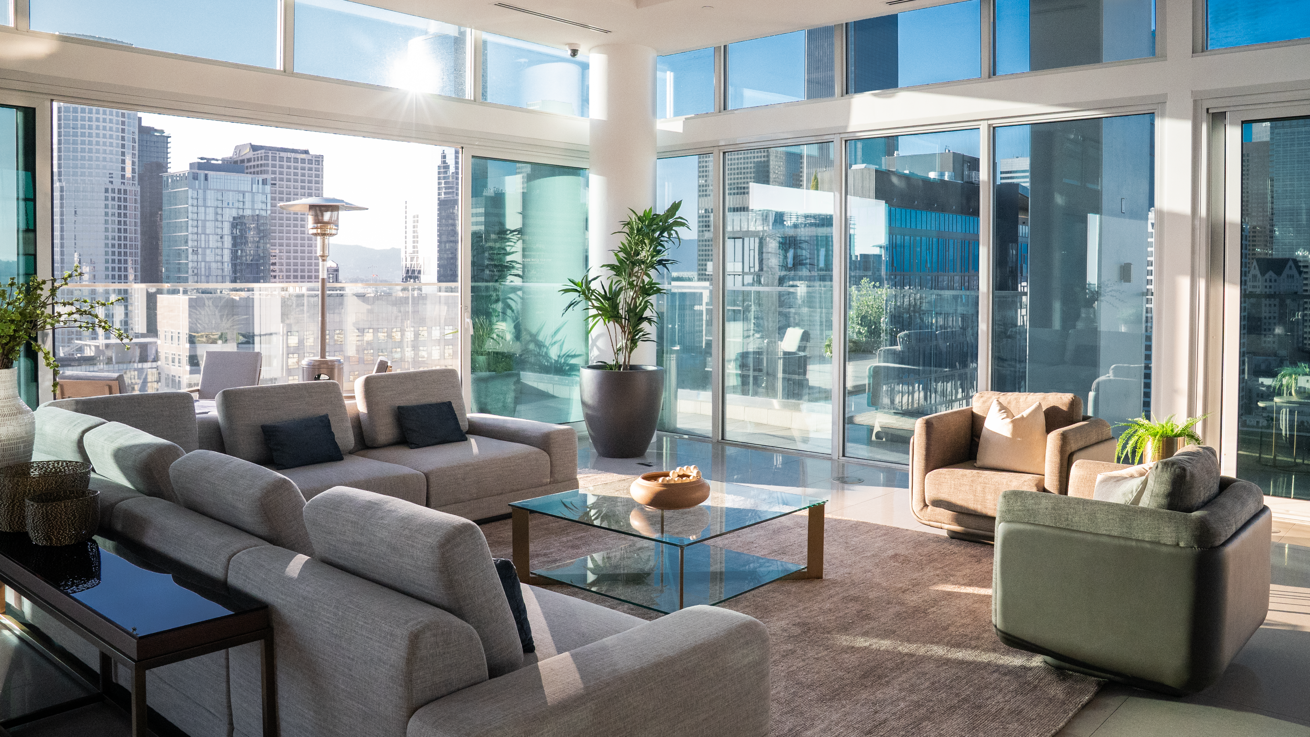 888 S. Olive great room with sectional and skyline view