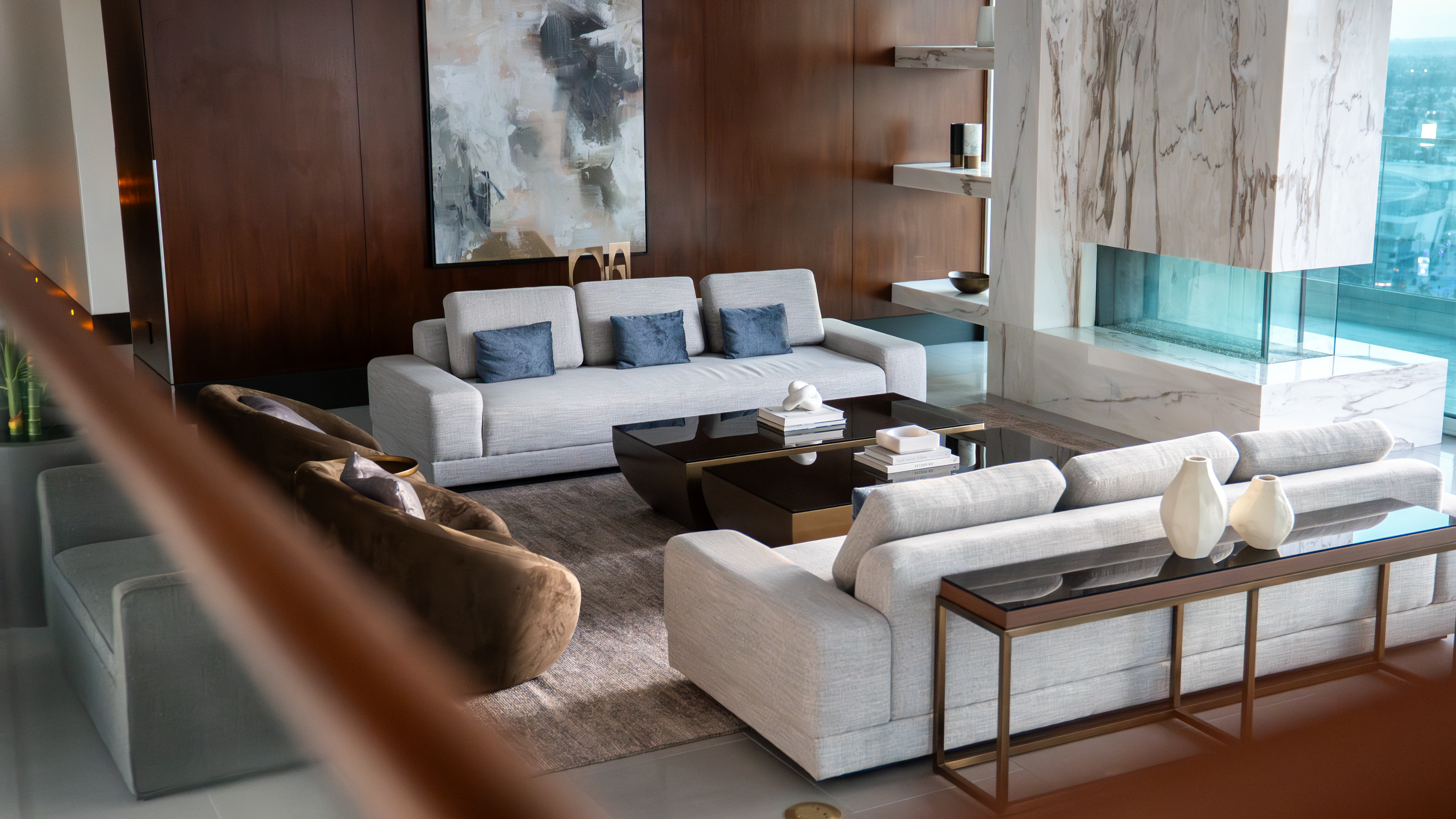 888 S. Olive formal living room with marble fireplace and abstract art