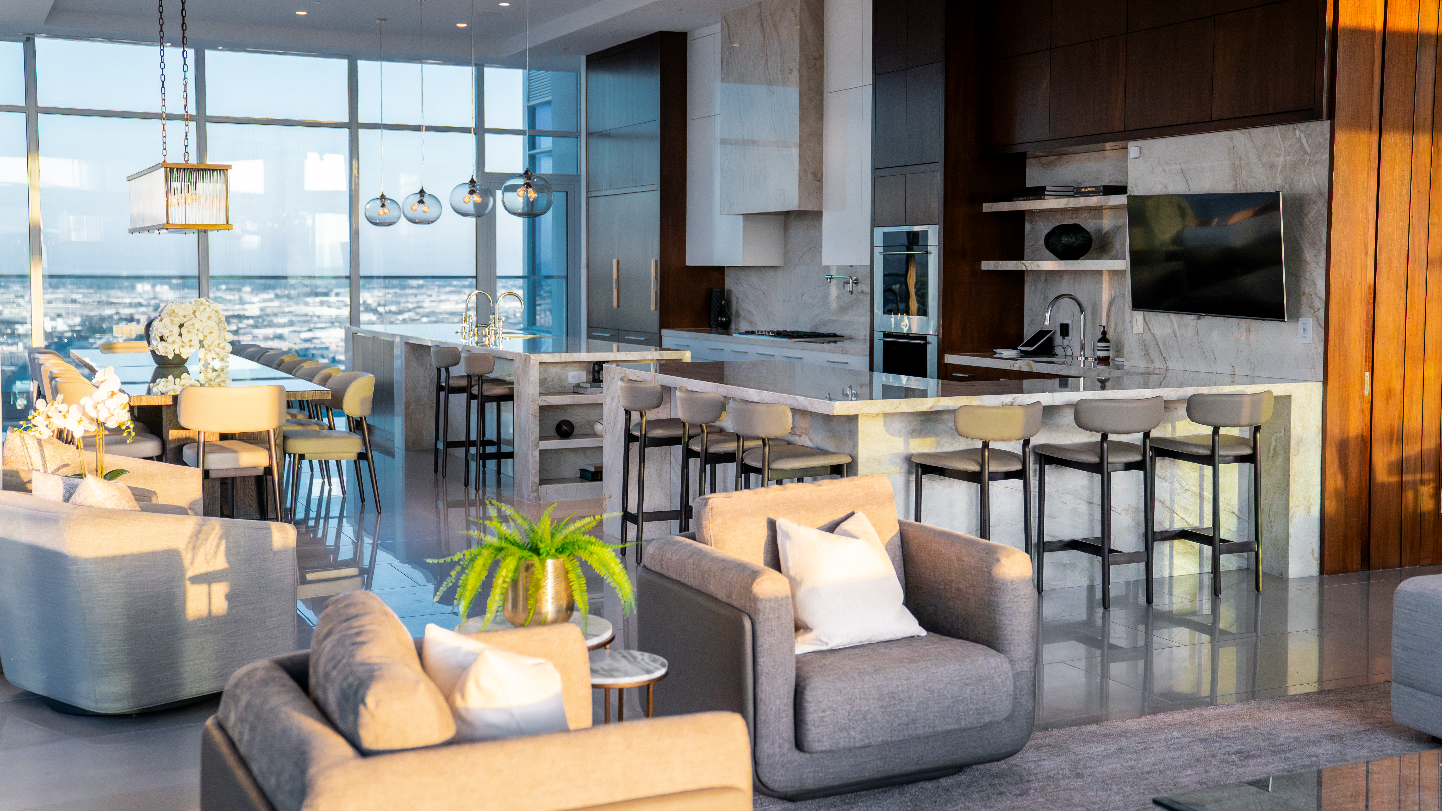 888 S. Olive open-plan main level — kitchen, dining, and lounge together