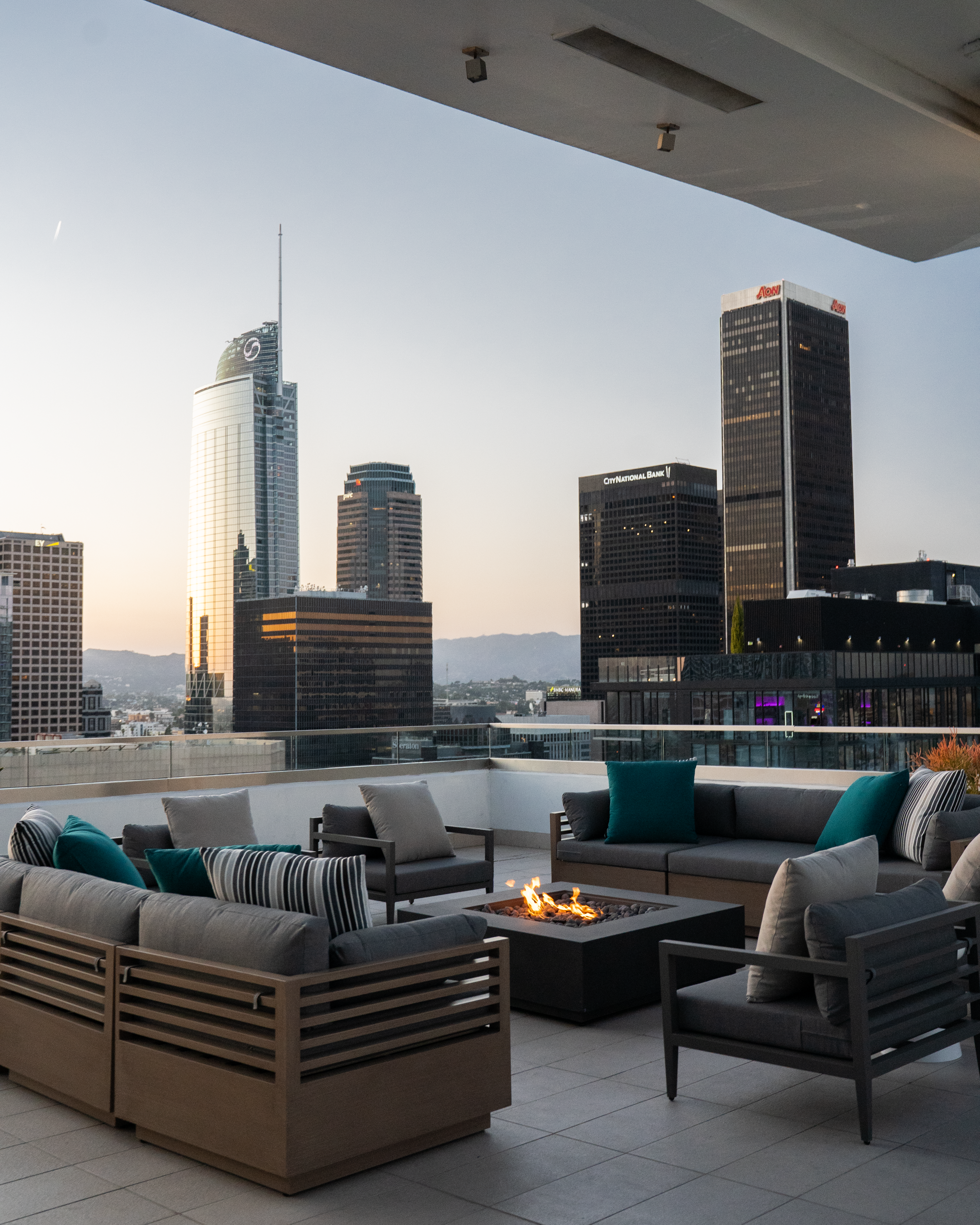888 S. Olive rooftop fire-pit lounge at dusk