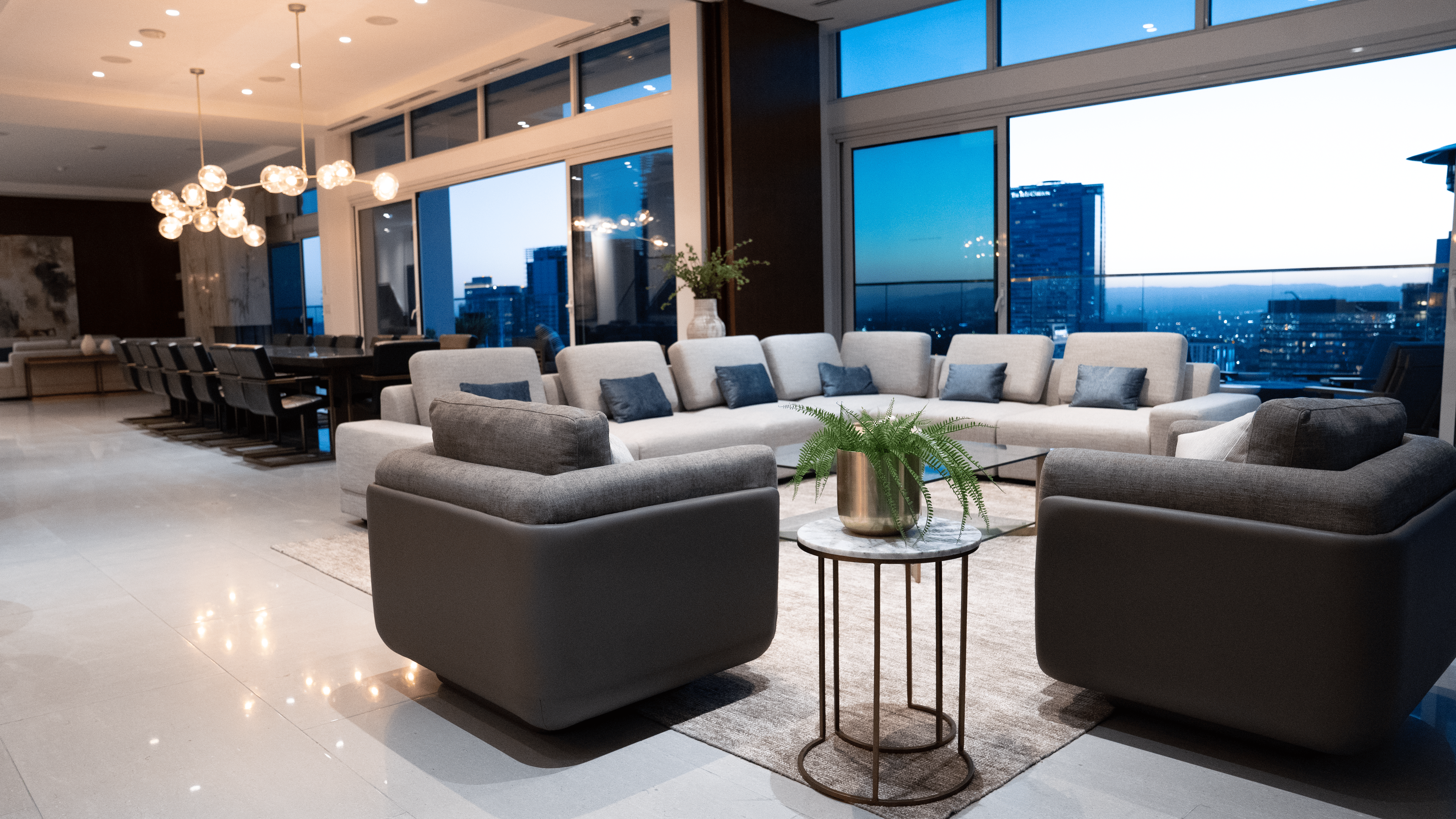 888 S. Olive great room at twilight with city lights