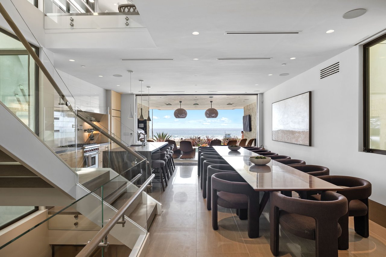 Long dining table with ocean view