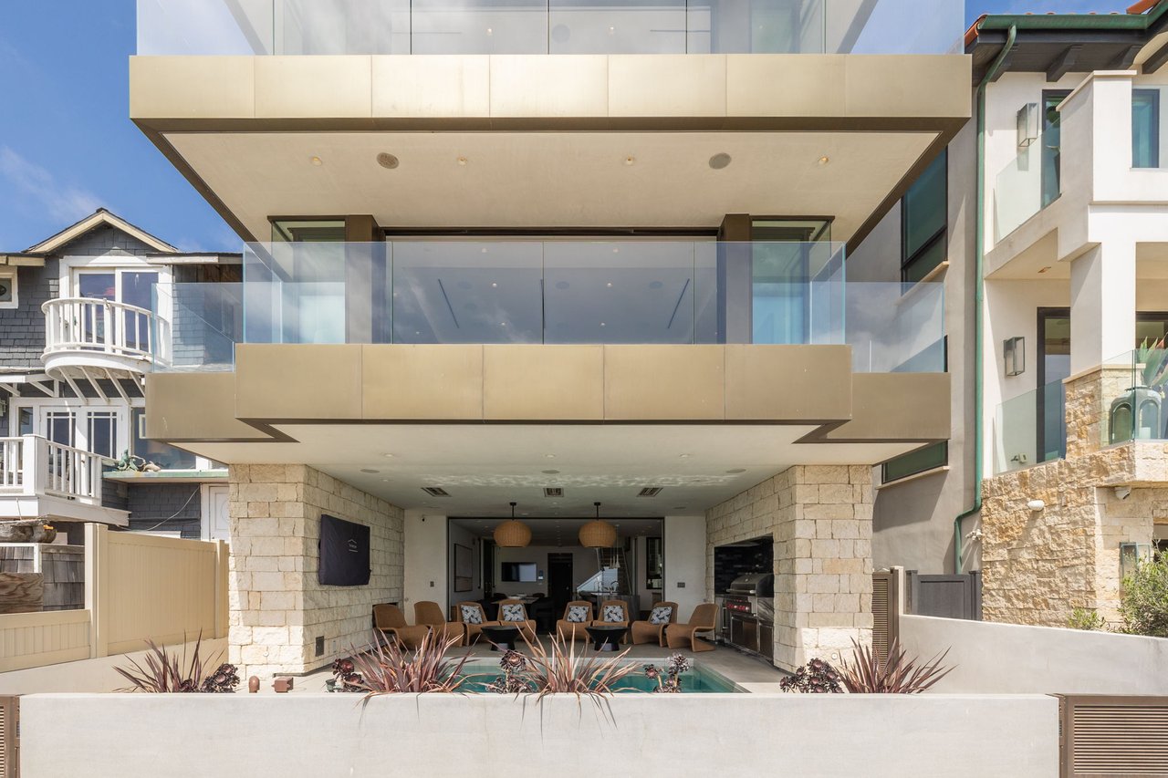 Strand-level patio and pool