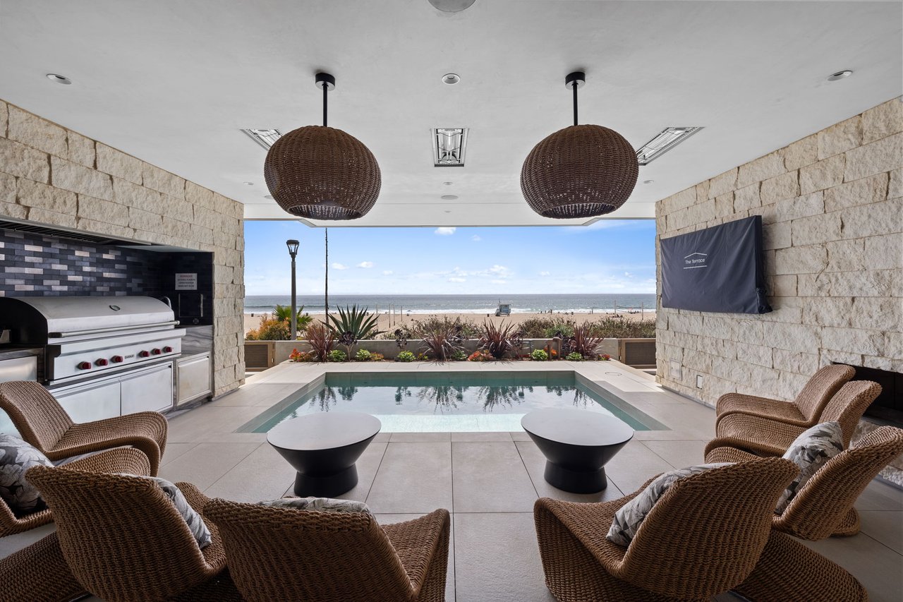 Pool terrace with ocean views and outdoor kitchen