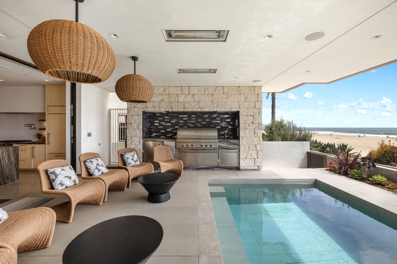 Pool deck with BBQ and lounge seating